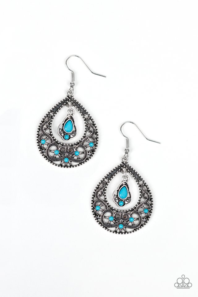 girl with blue earring
